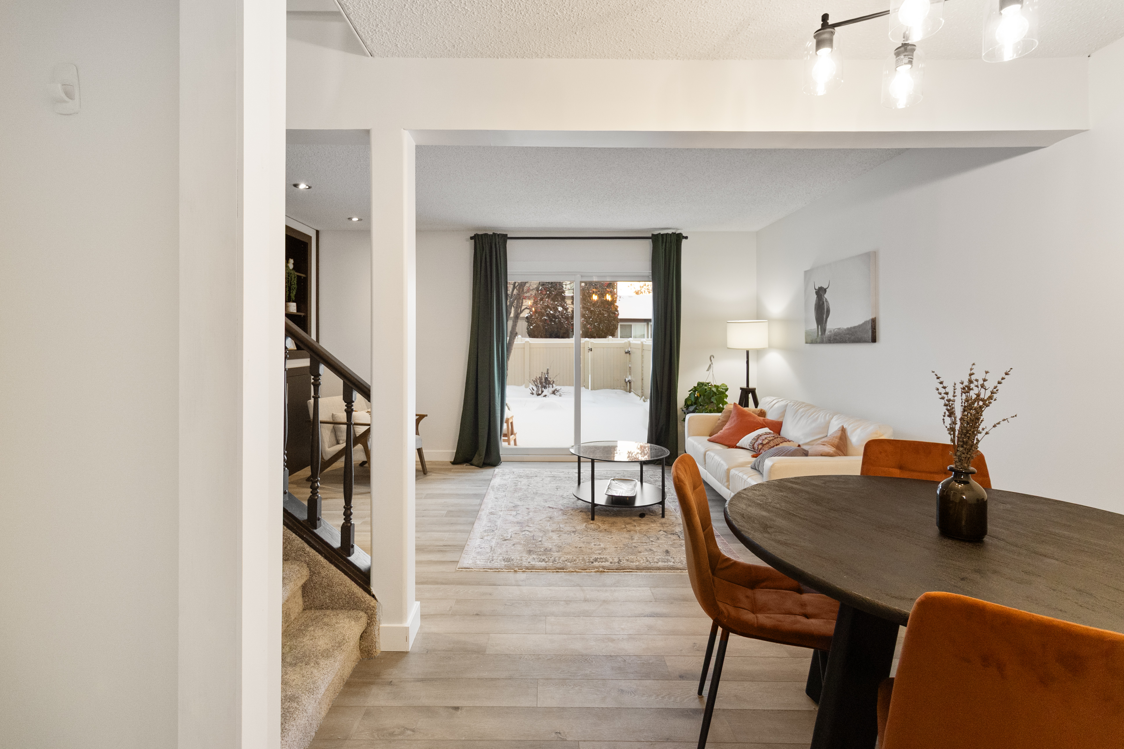 Fort Sask — living and dining area, slider to yard